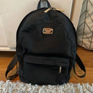 Black medium sized Michael Kors bags